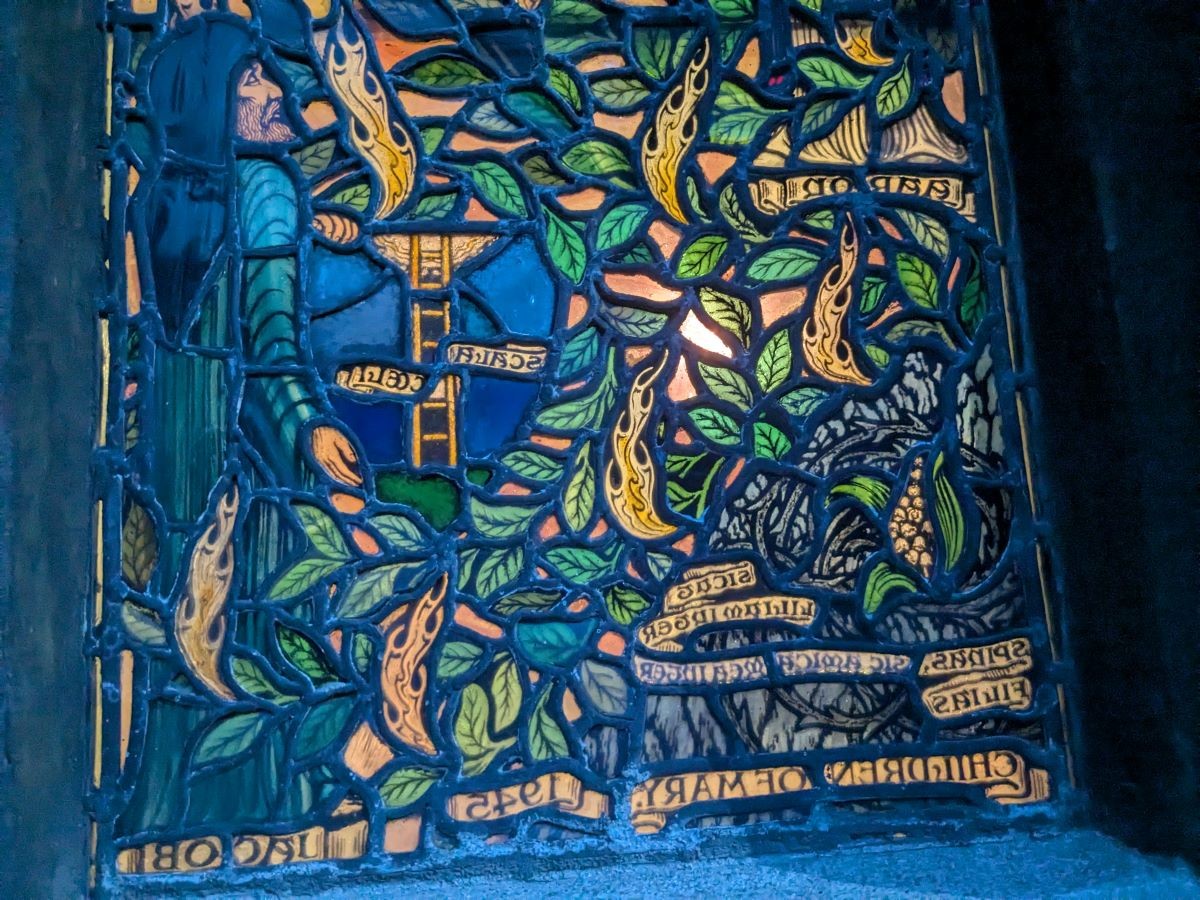 Left lower detail of the Jesse tree window looking in from outside the window