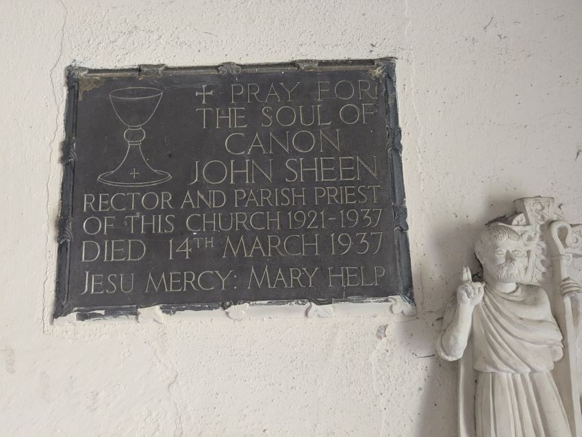 Canon Sheen's plaque on the right side of the porch